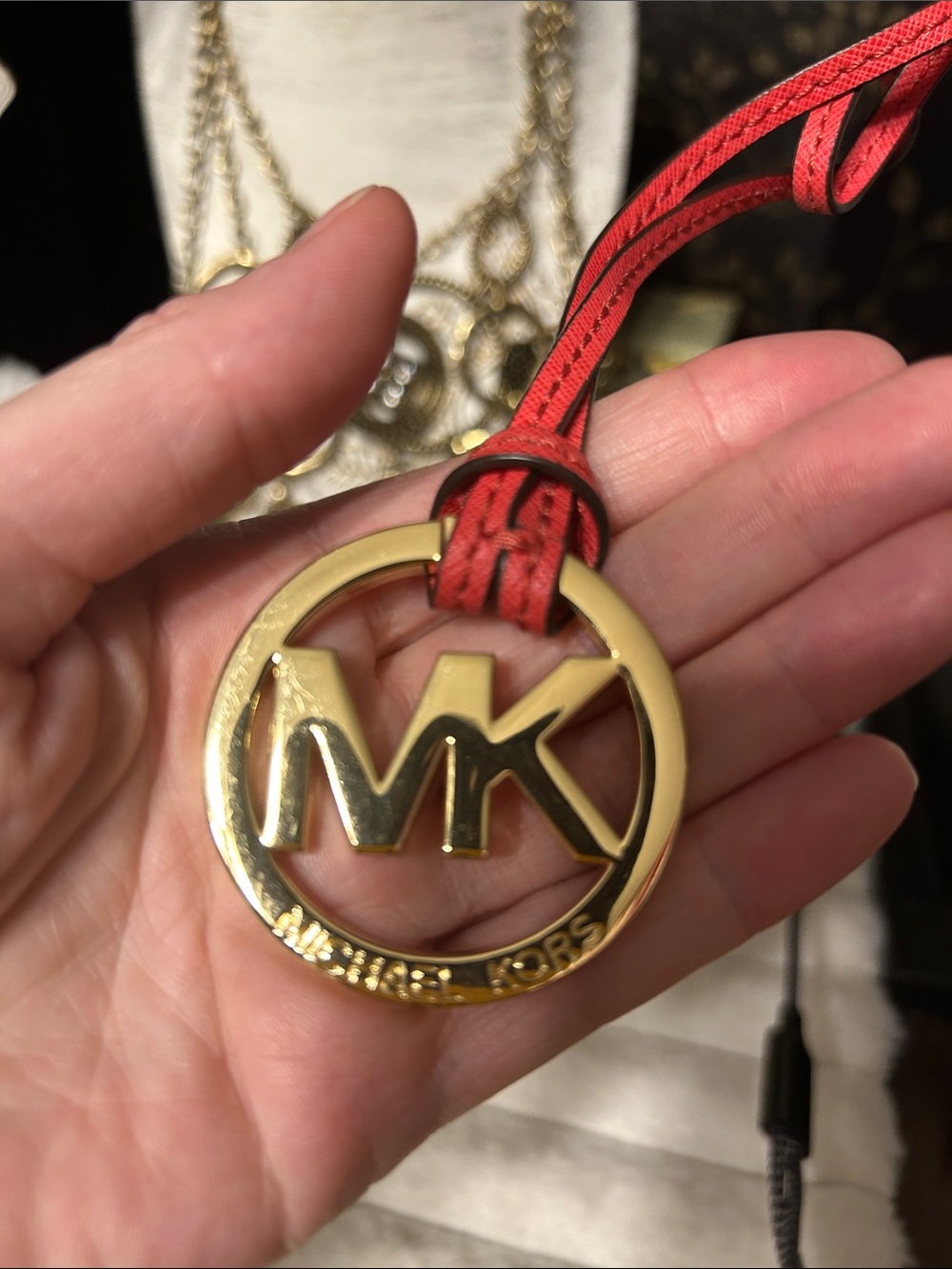 Michael Kors Gold MK Round Pendant with Red Leather Strap